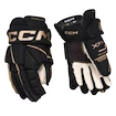 Hokejové rukavice CCM Tacks XF 80 Black/Gold Junior 10 palcov